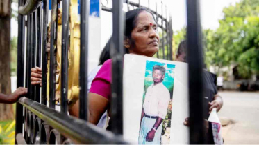 শ্রীলঙ্কায় পাওয়া গেল সর্ববৃহৎ গণকবর, স্বজনদের খুঁজছেন তামিলরা শ্রীলঙ্কায় পাওয়া গেল সর্ববৃহৎ গণকবর, স্বজনদের খুঁজছেন তামিলরা